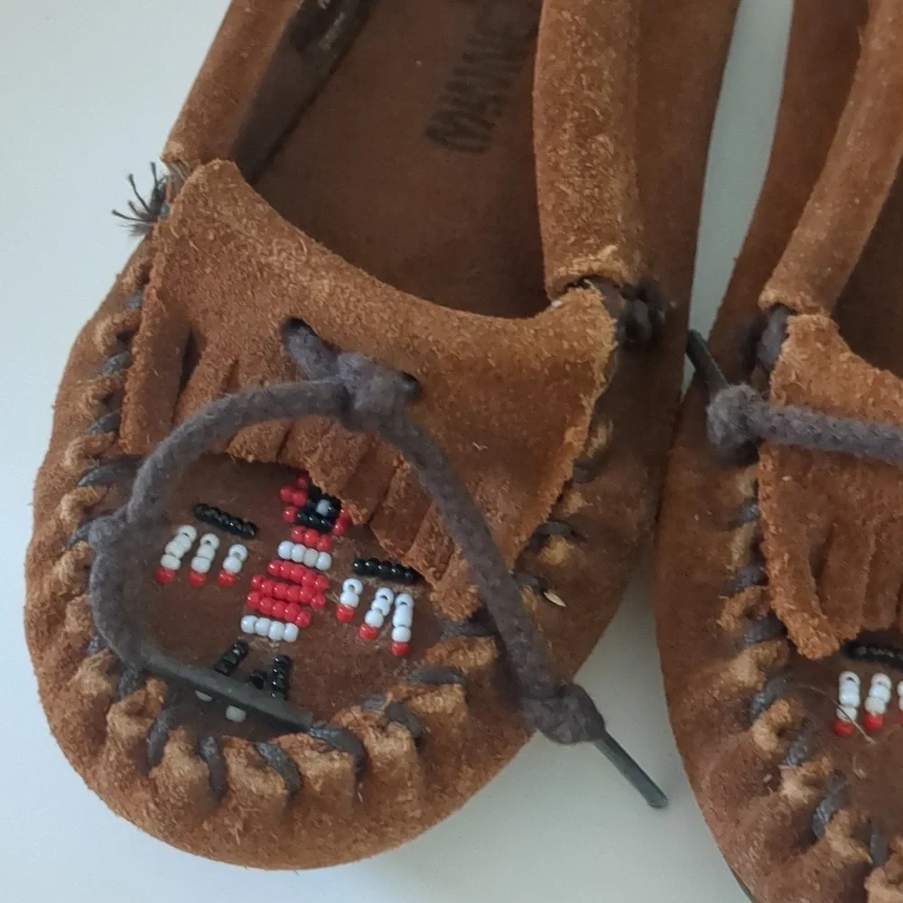 Minnetonka beaded thunderbird slip on Moccasin